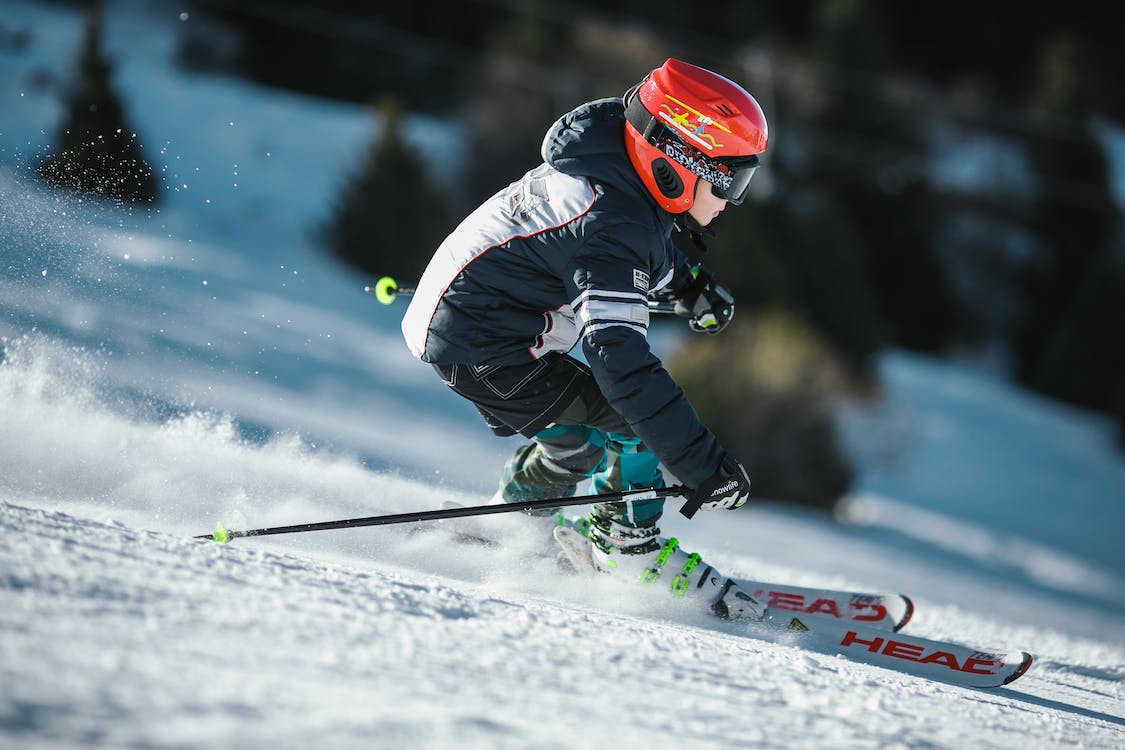 Snow activities and ski enthusiasts enjoying a winter day at Mt. Buller